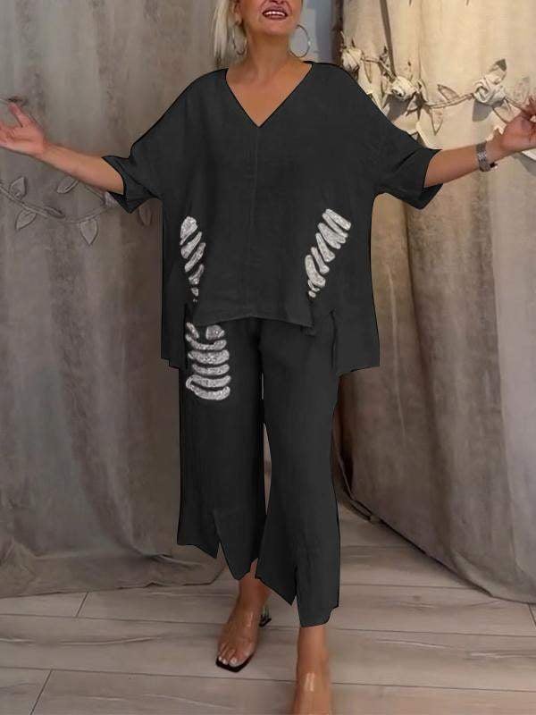 Ensemble deux pièces noir : haut ample décolleté V et pantalon fluide assorti