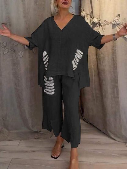 Ensemble deux pièces noir : haut ample décolleté V et pantalon fluide assorti