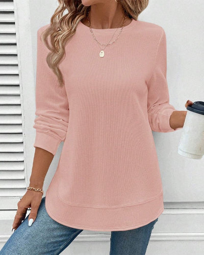Haut manches longues rose, encolure ronde, ourlet arrondi et coupe ample