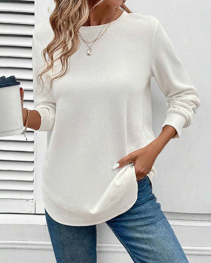 Haut manches longues blanc, encolure ronde, ourlet arrondi et coupe ample