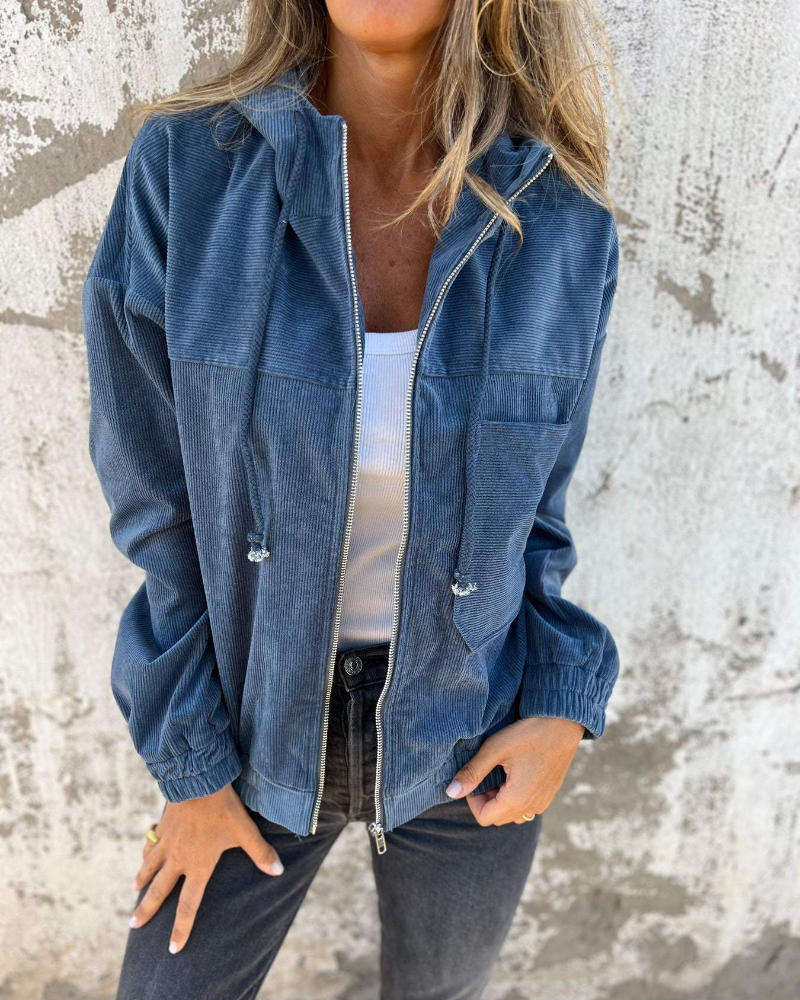 Veste en velours côtelé bleue zippée, poches poitrine, poignets élastiques