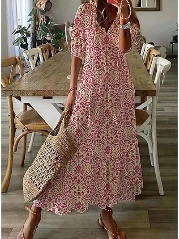 Robe maxi rose à motif cachemire, encolure V, manches mi-longues, jupe ample.