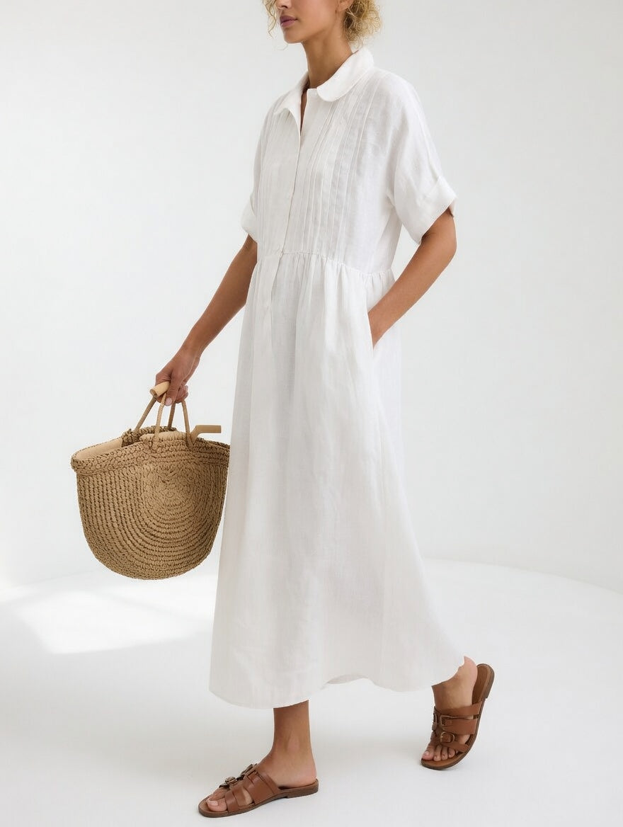 Robe chemise fluide blanche, manches courtes, col, patte boutonnée, taille froncée