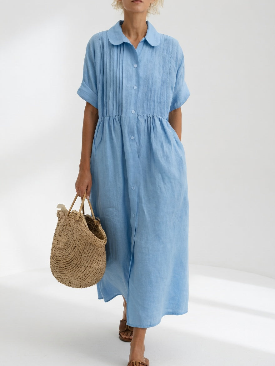 Robe chemise fluide bleu clair, manches courtes, col, patte boutonnée, taille froncée