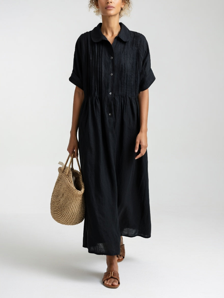 Robe chemise fluide noire, manches courtes, col, patte boutonnée, taille froncée