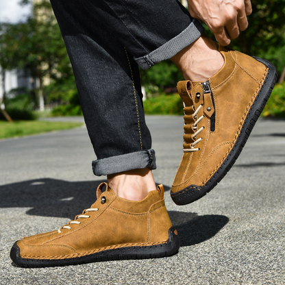 Chaussures homme nubuck marron zippées sur le côté, lacets et semelle crantée