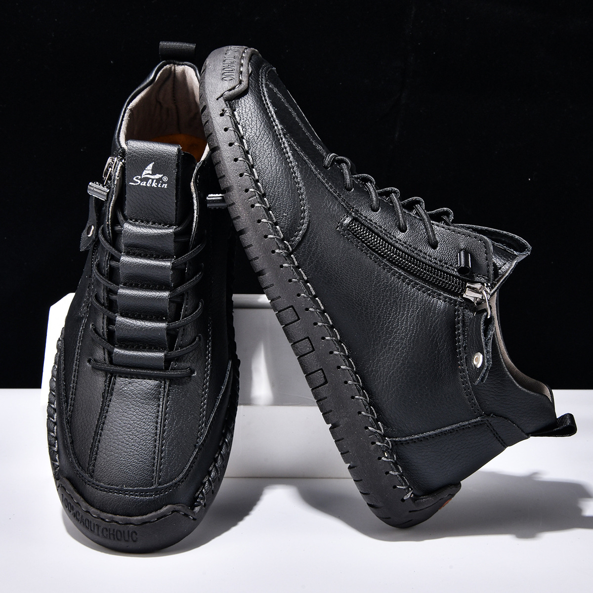 Chaussures homme en nubuck noir zippées, lacets et semelle crantée