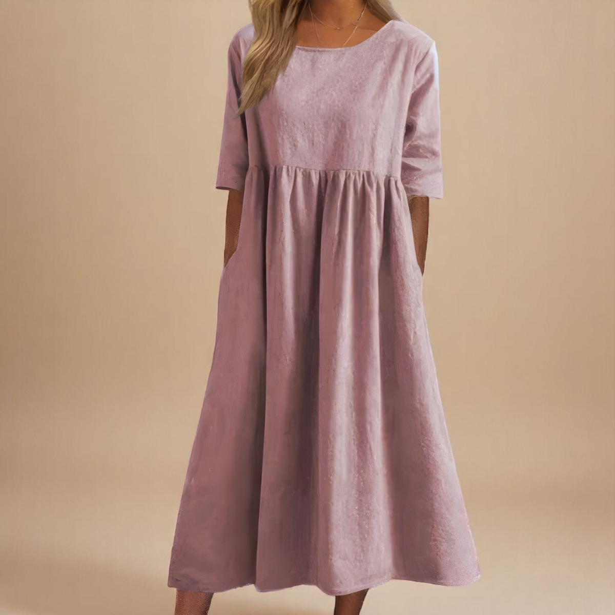 Robe en coton aéré rose, manches 3/4, encolure ronde, taille froncée, ample