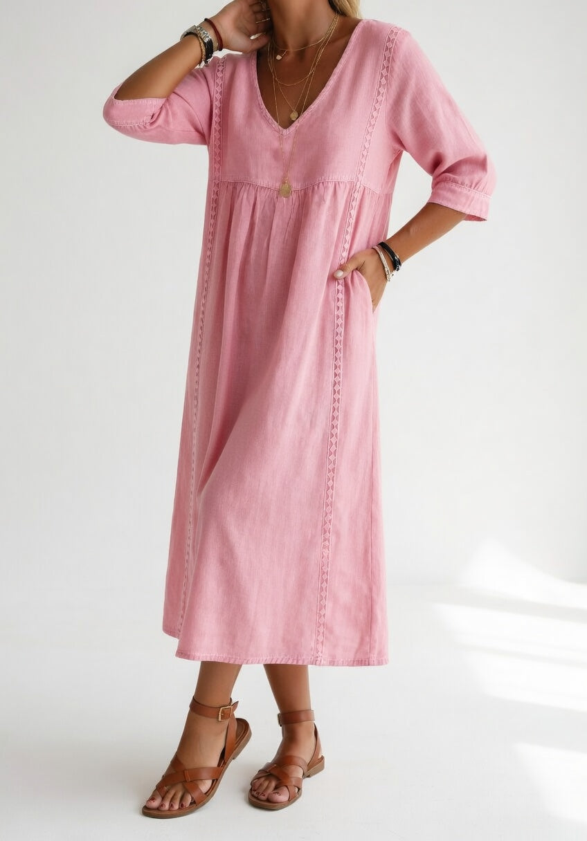 Robe midi rose, décolleté V, manches mi-longues, empiècement fronçé