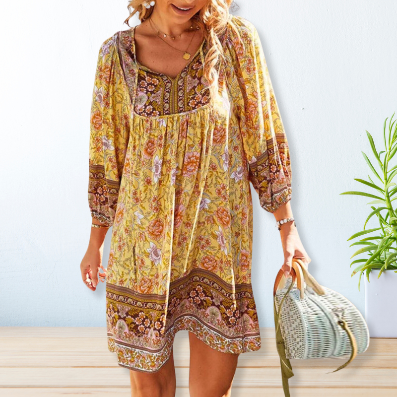 Robe ample jaune imprimée fleurs, encolure carrée, manches 3/4 bouffantes, bordure