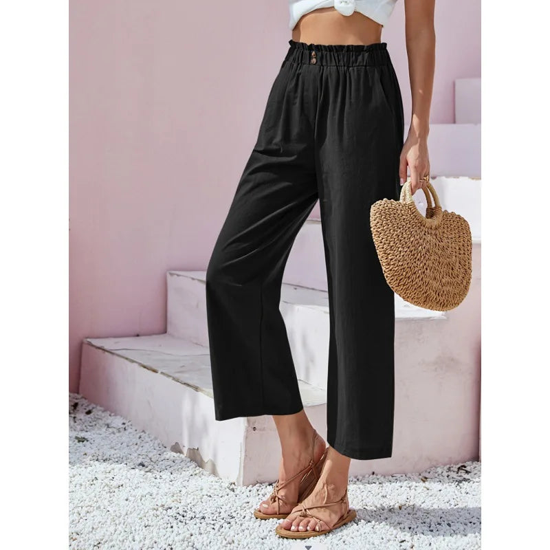 Pantalon lin-coton noir, taille élastique, jambes amples 7/8.