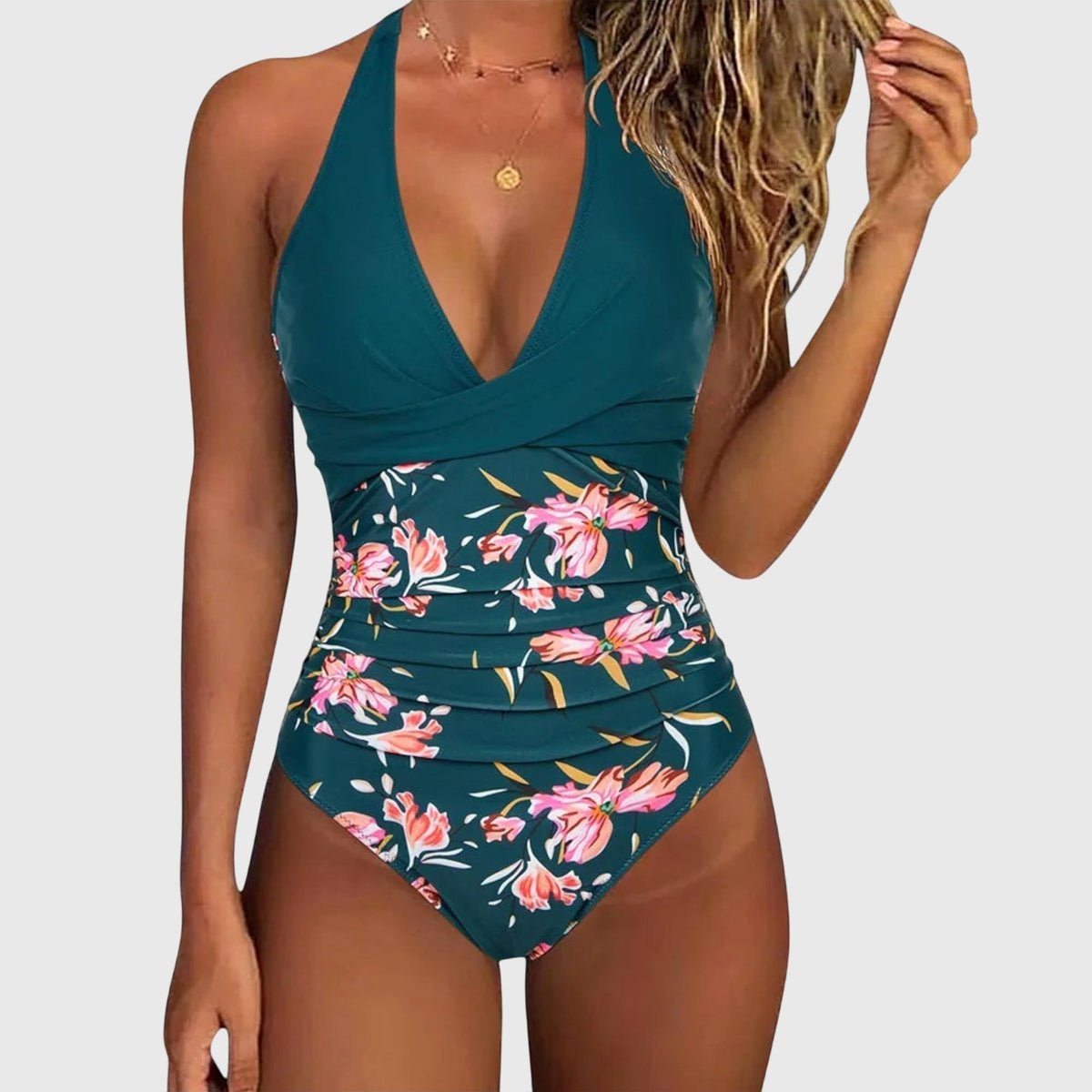 Maillot de bain une pièce bleu-vert, décolleté V, bas feuillages fleuris multicolores