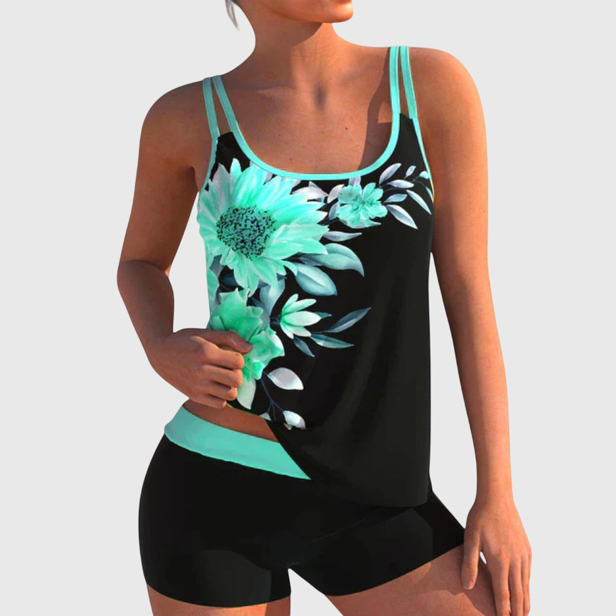 Ensemble maillot de bain deux pièces noir à fleurs turquoise, bretelles contrastées