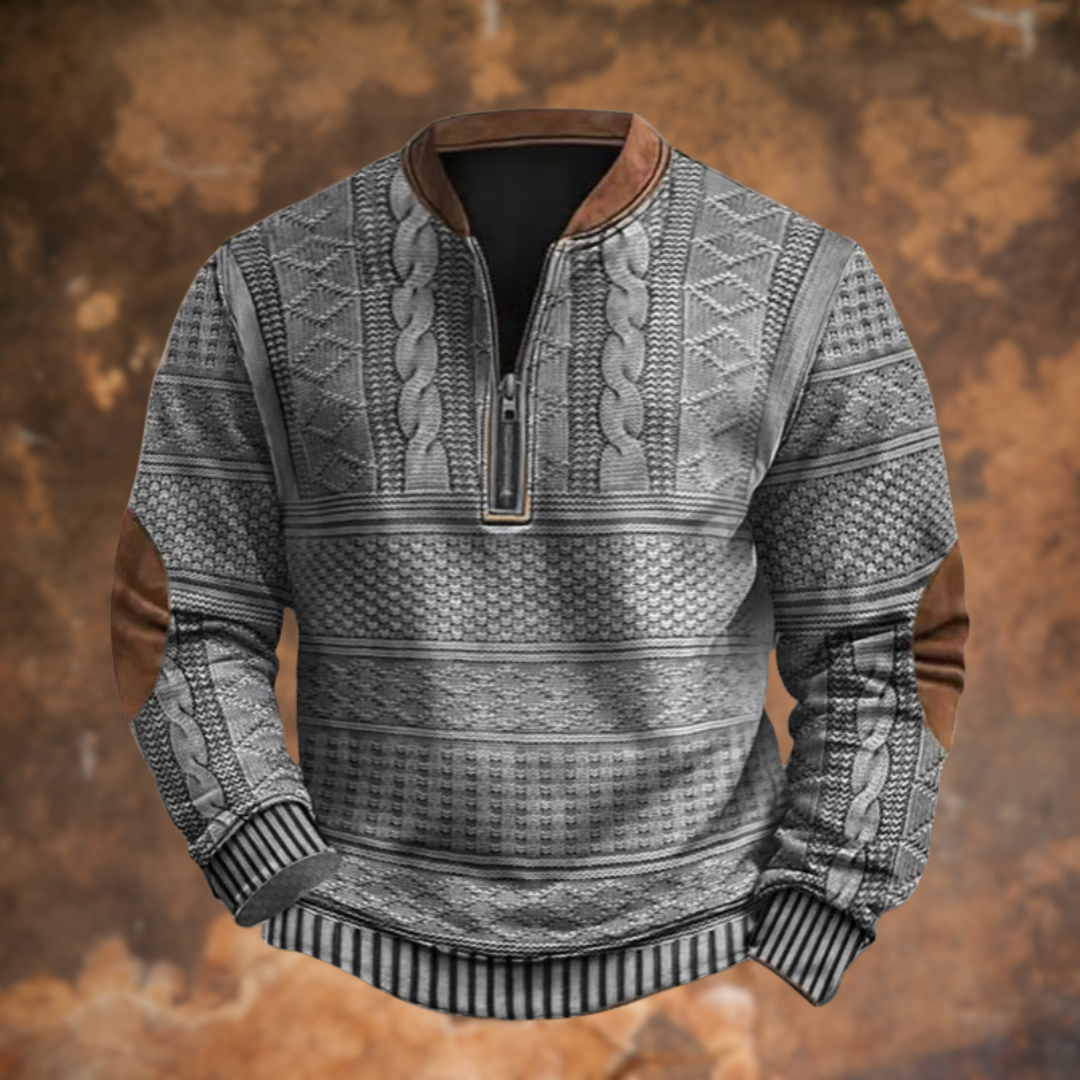 Polo homme demi-zip en maille bleu-gris à motifs tressés, bas côtelé rayé.