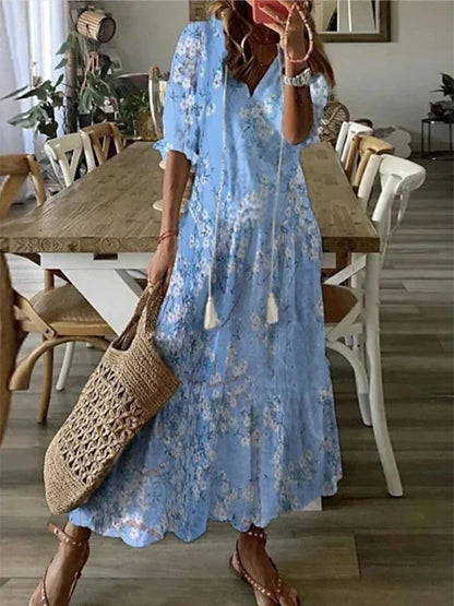 Robe bohème chic Ines bleu clair à motif, manches courtes, ourlet volanté mi-long