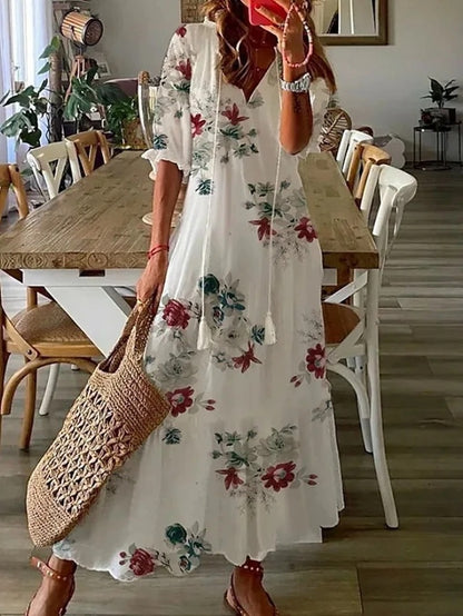 Robe bohème chic Ines blanche à fleurs rouges et vert foncé, manches trois-quarts, ample