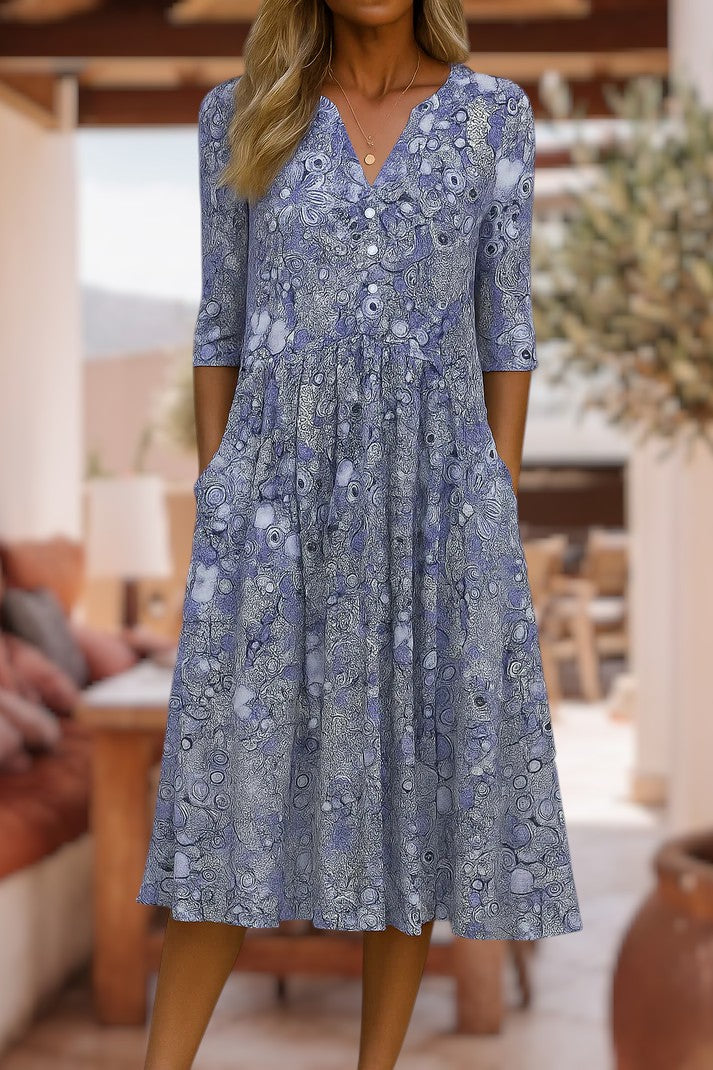 Robe décontractée élégante bleue à motif, encolure V, manches 3/4, coupe évasée.