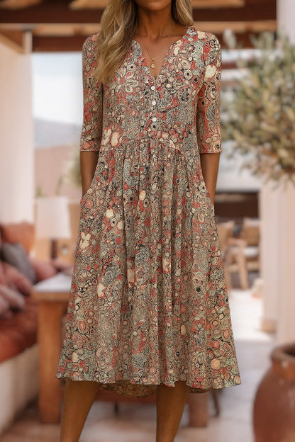 Robe décontractée élégante beige à motif floral, encolure V, manches 3/4, coupe évasée.