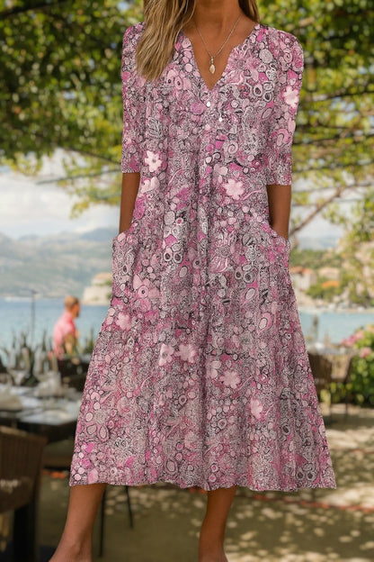 Robe décontractée élégante rose à motif floral, encolure V, manches 3/4, coupe évasée.