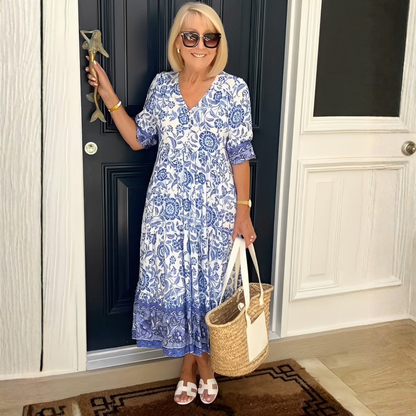 Robe fluide légère bleue à motifs floraux, encolure V, manches courtes, silhouette ample