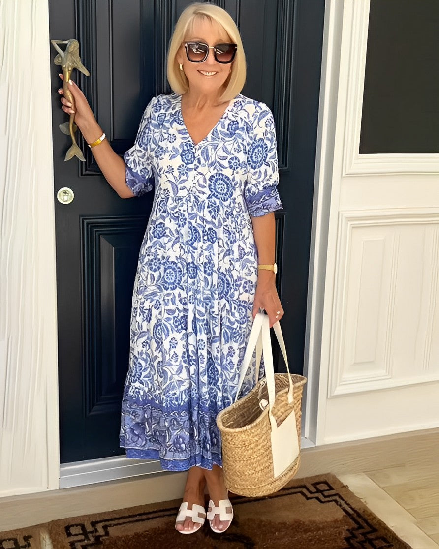 Robe fluide légère bleue à manches courtes, encolure V, imprimé floral, volantée bas