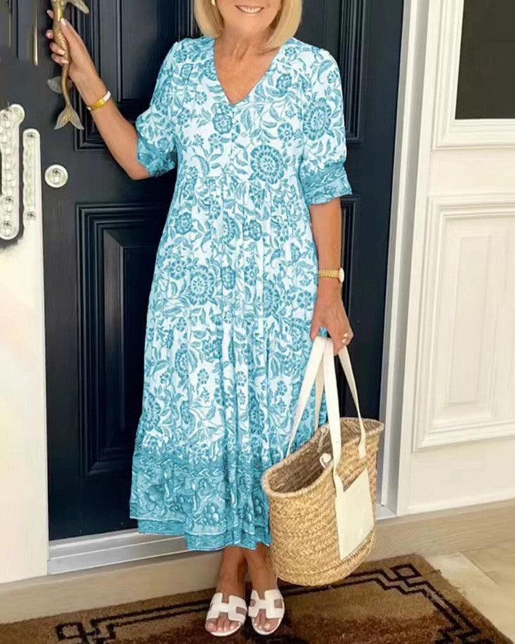Robe fluide légère bleu clair imprimée, encolure V, manches courtes, bas volanté