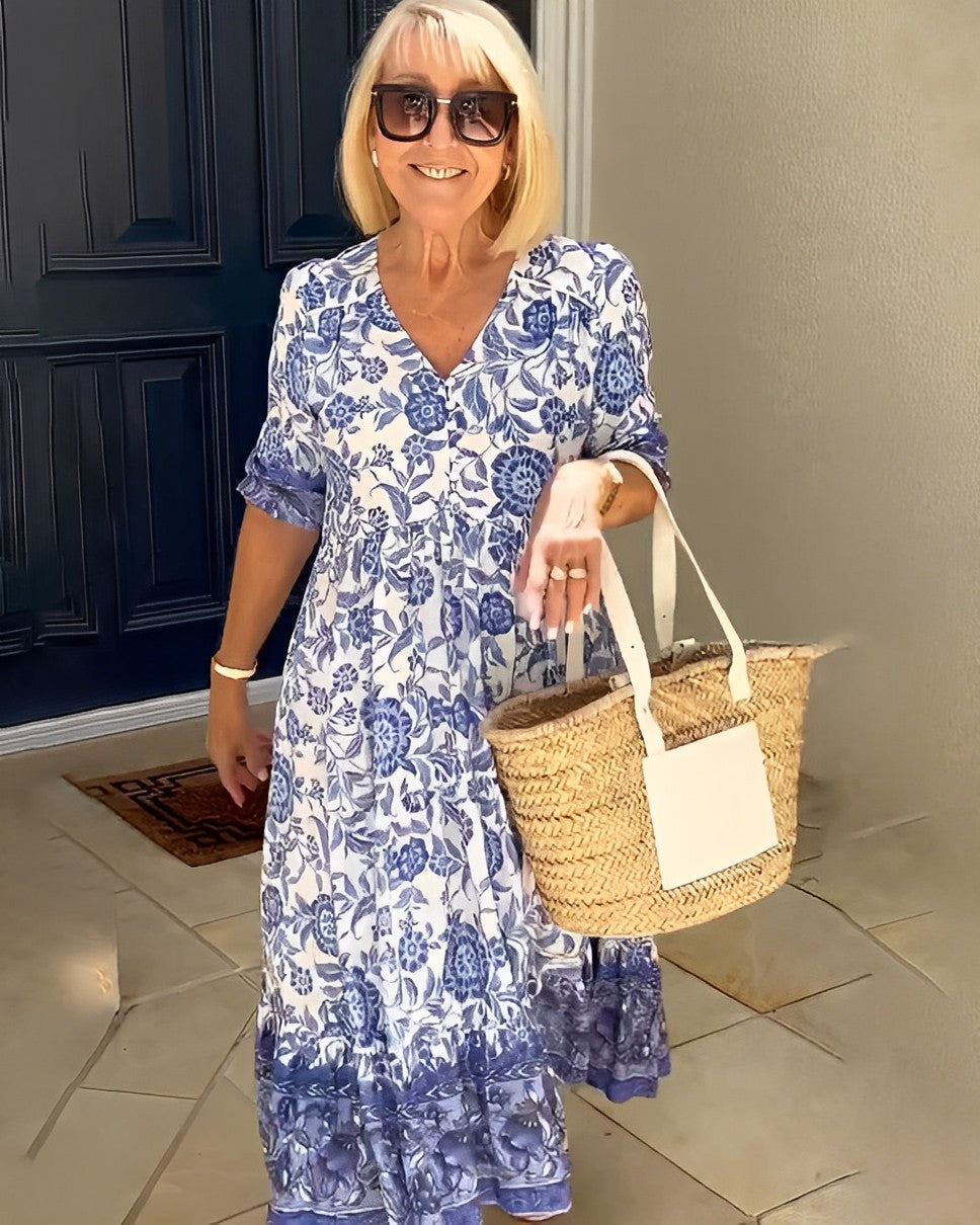 Robe fluide légère bleue imprimée, encolure V, manches courtes, jupe à volants