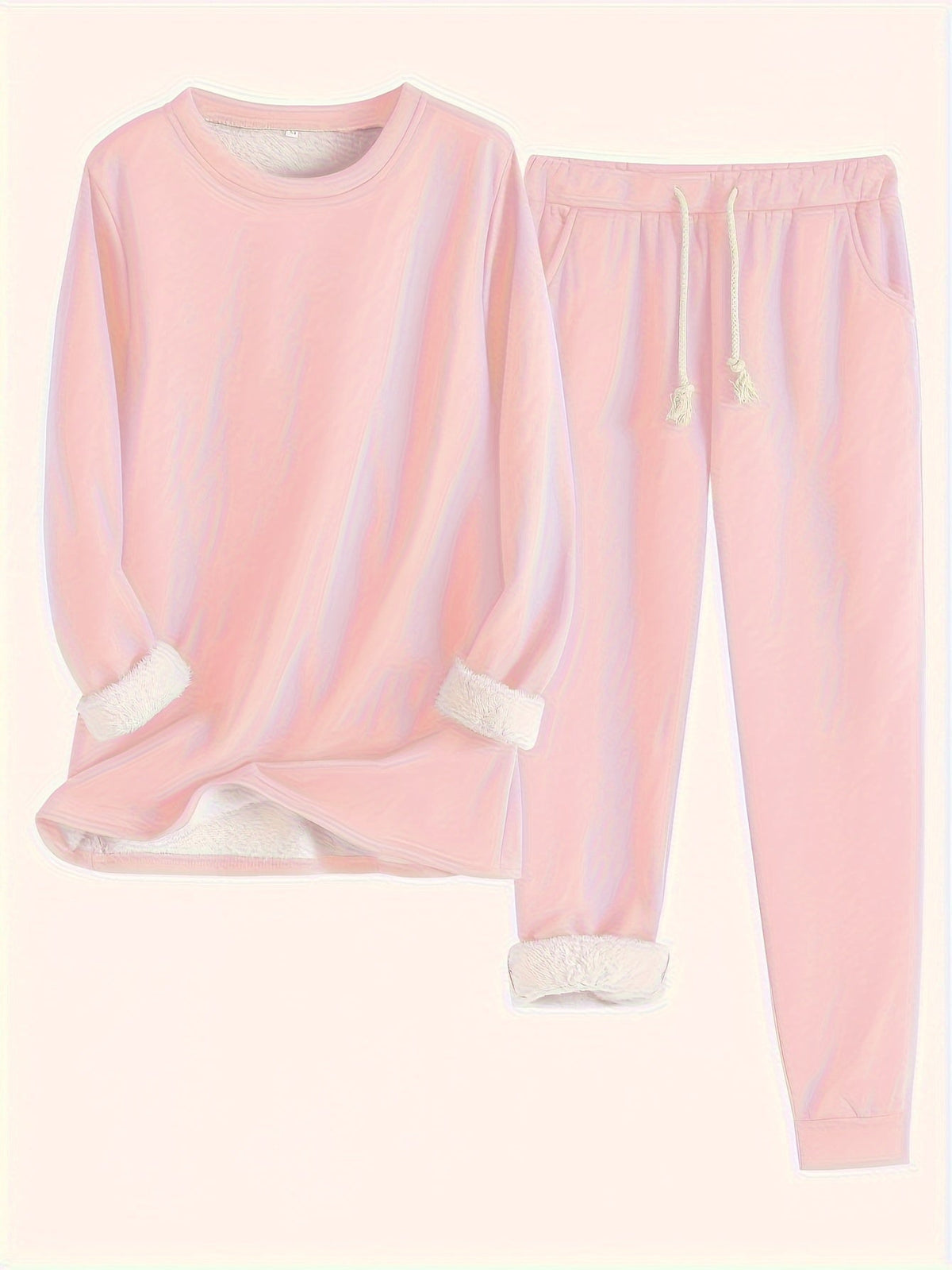 Ensemble de détente rose clair : sweat manches longues et pantalon jogging à cordon.