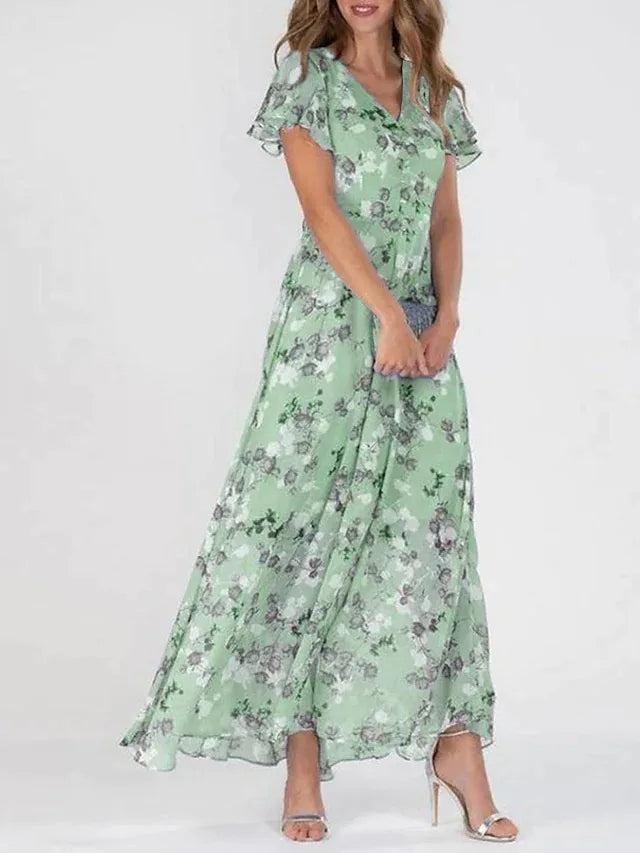 Robe longue fleurie verte à col V et manches volantées