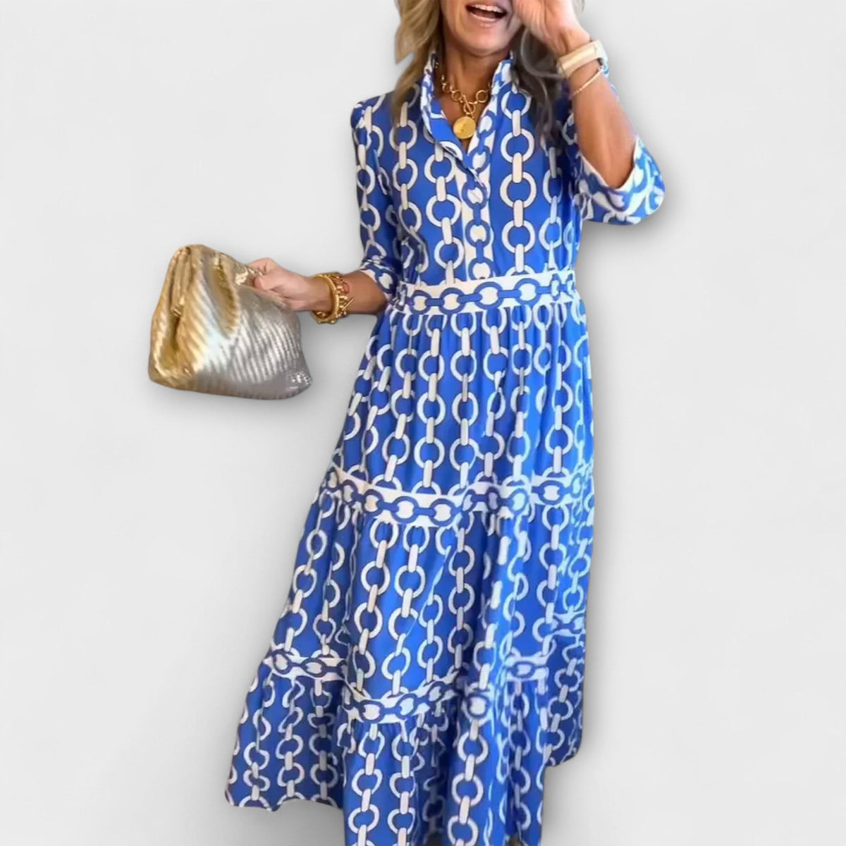 Robe midi sombre à motif chaînes, manches 3/4 et ourlet volanté