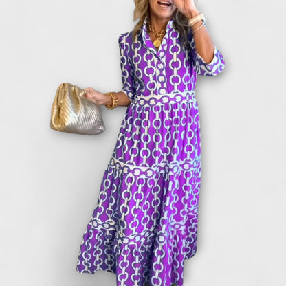 Robe midi violette à motif chaînes, manches 3/4 et ourlet volanté