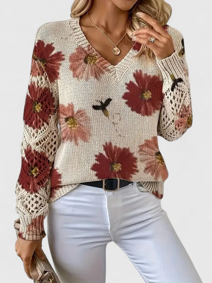 Gilet fleuri léger beige col V, fleurs rouges, manches ajourées en crochet, maille fine