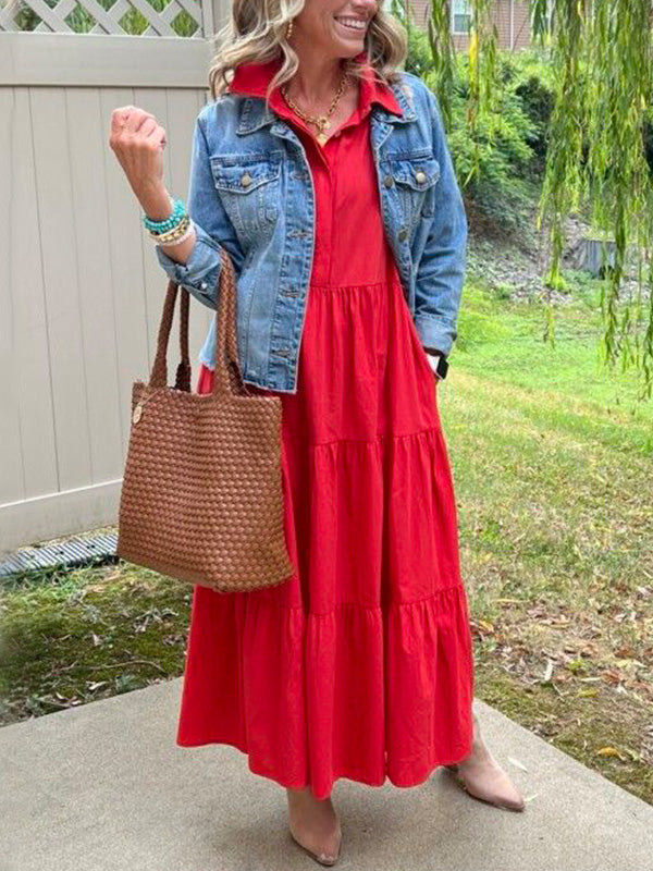Robe longue rouge à encolure boutonnée, manches longues et volants superposés.