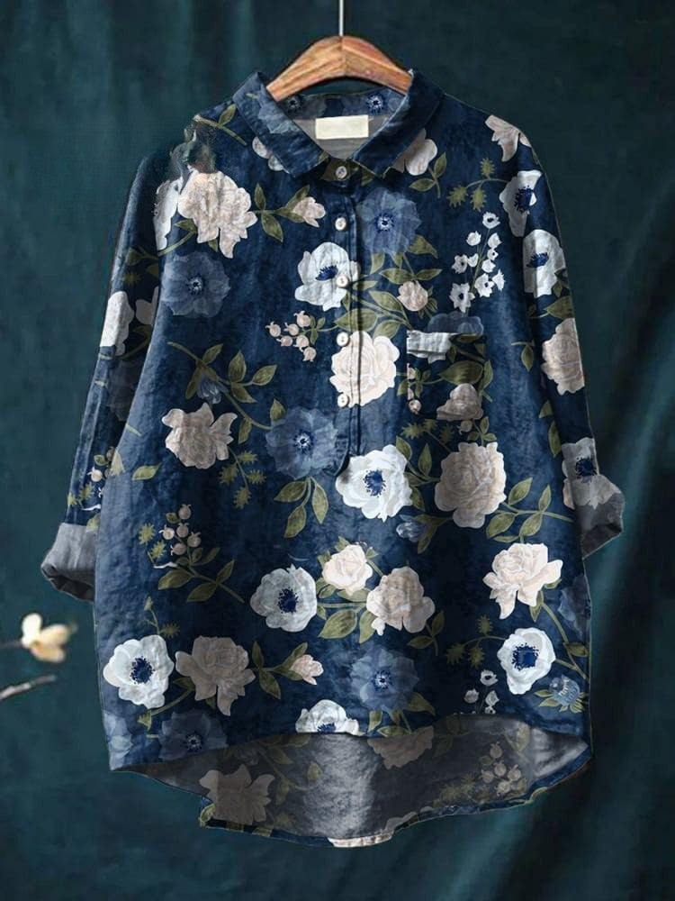Chemise bleue à motif fleurs, manches longues, boutonnage devant