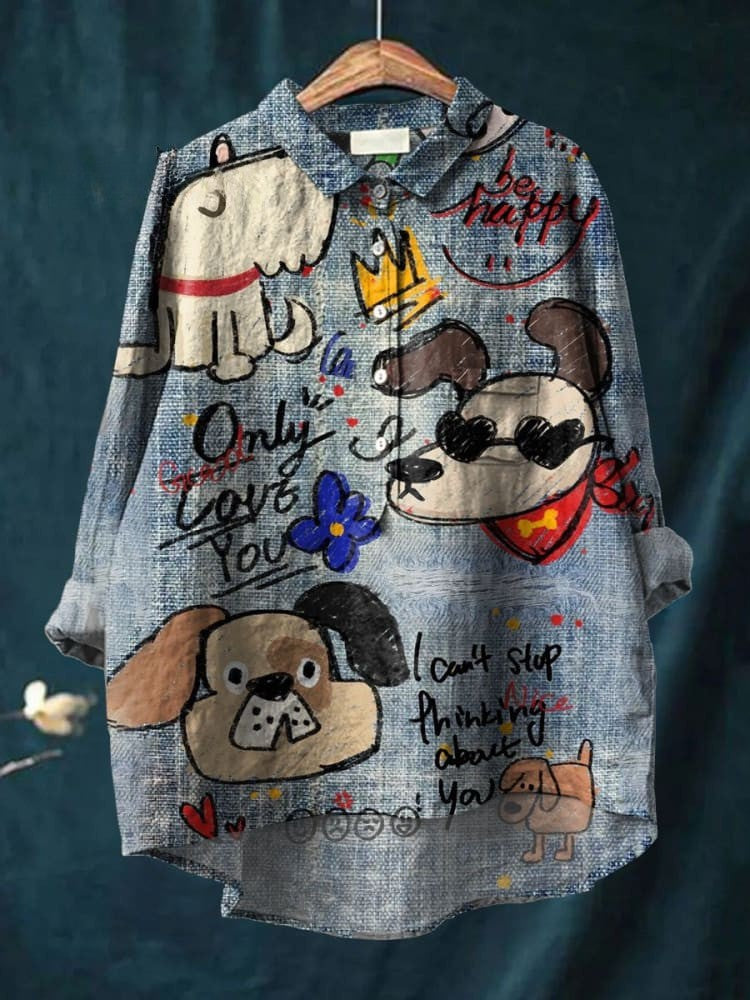 T-shirt bleu à manches longues avec gribouillages de chiens colorés