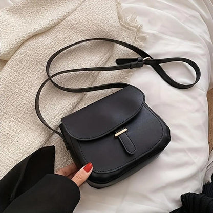 Sacoche de selle vintage noire, rabat à boucle, bandoulière réglable