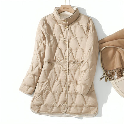 Manteau matelassé beige clair, col montant, fermeture boutonnée