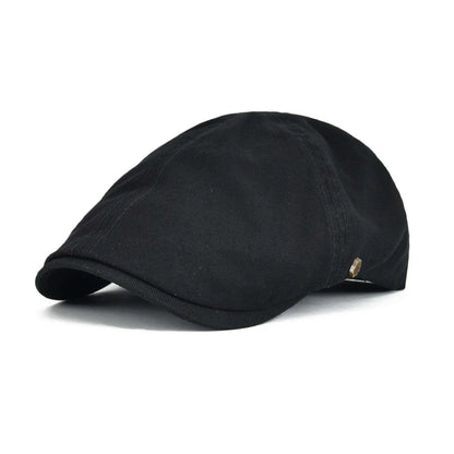 Casquette de golf Bloom™ en coton noir, visière courbée, petit écusson doré.
