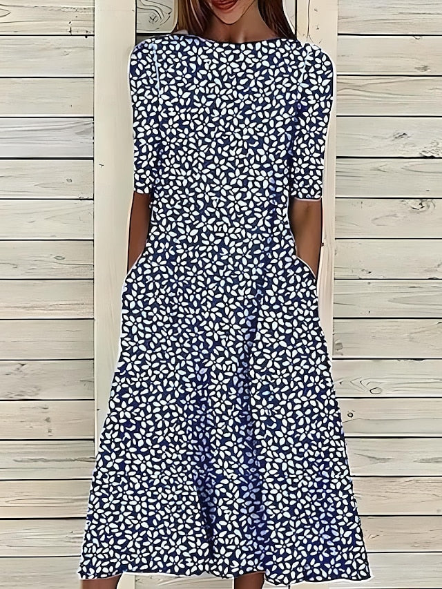 Robe mi-longue bleu foncé à col carré, manches courtes, motif végétal blanc