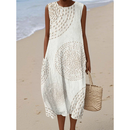 Robe rétro sans manches beige à encolure ronde, motif circulaire et volant léger