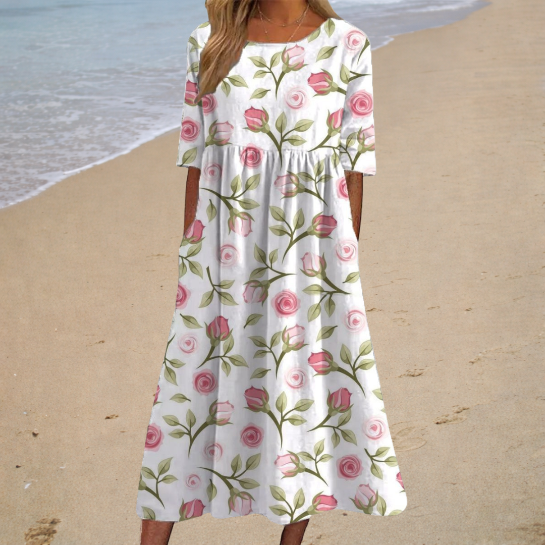 Robe midi blanche à manches courtes, imprimé roses, coupe évasée.