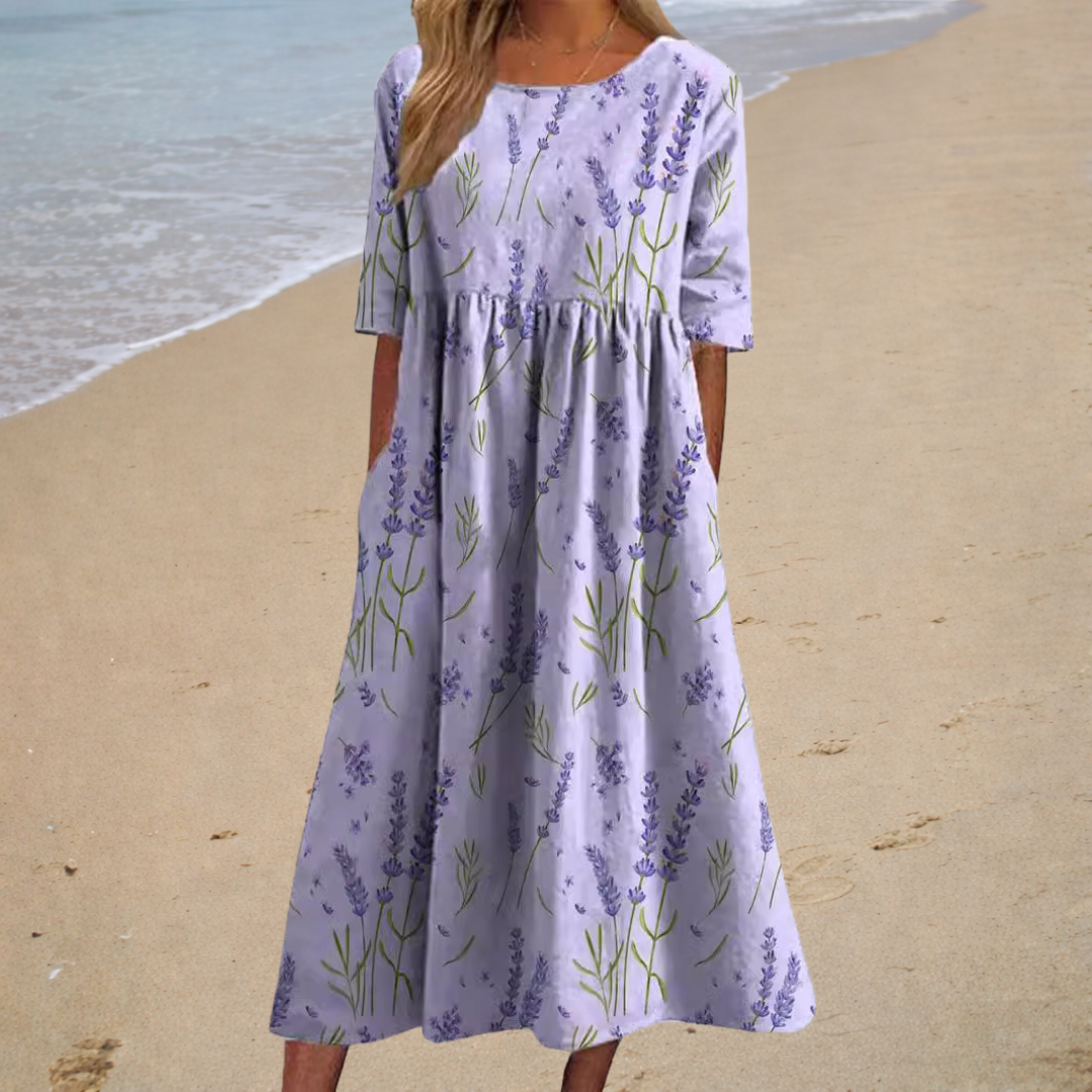 Robe midi lilas à manches courtes, imprimé fleurs de lavande, coupe évasée.