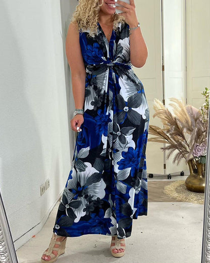 Robe longue d’été Sacha bleue à fleurs, col V, sans manches avec ceinture nouée