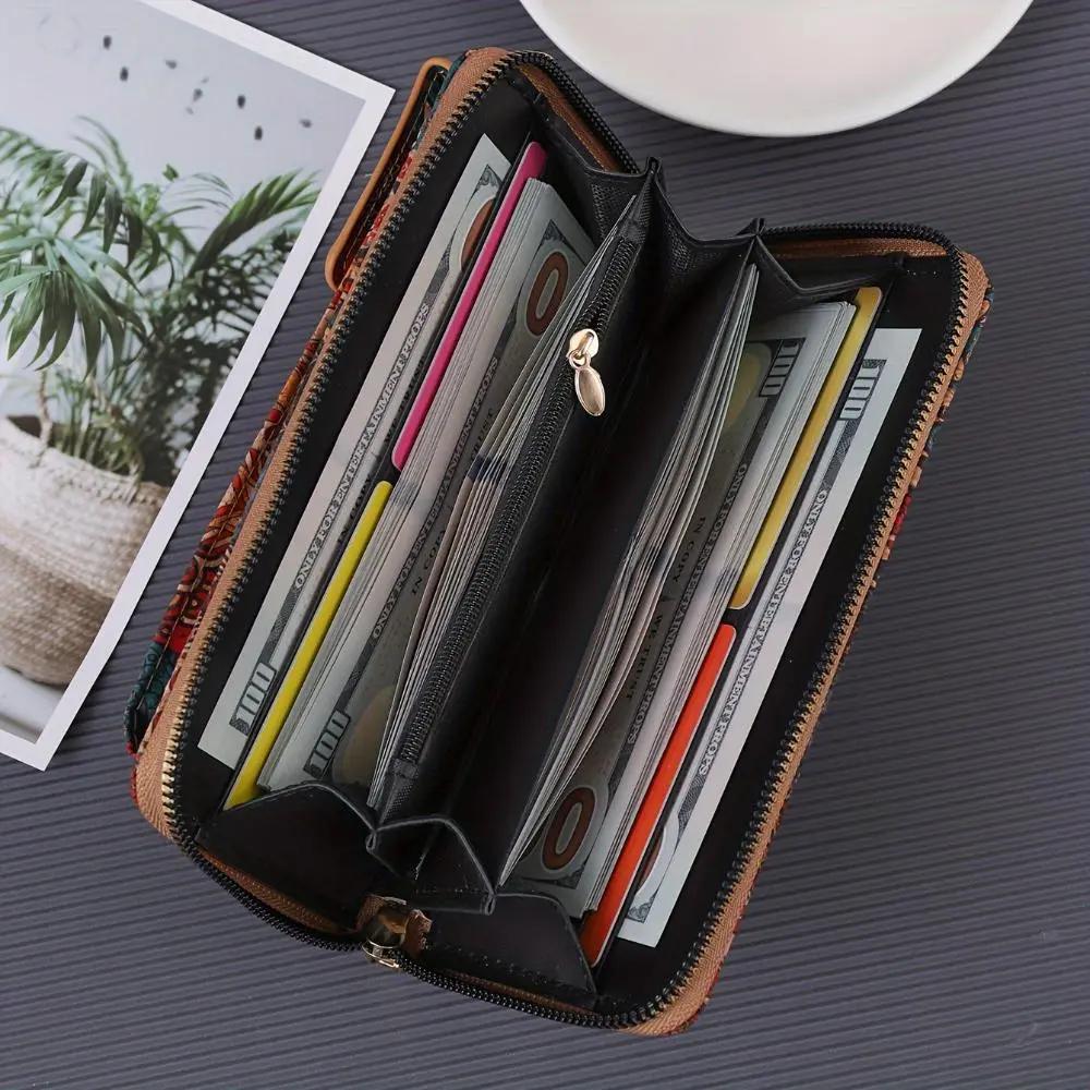 Portefeuille zippé en tissu, compartiments à cartes visibles à l’intérieur