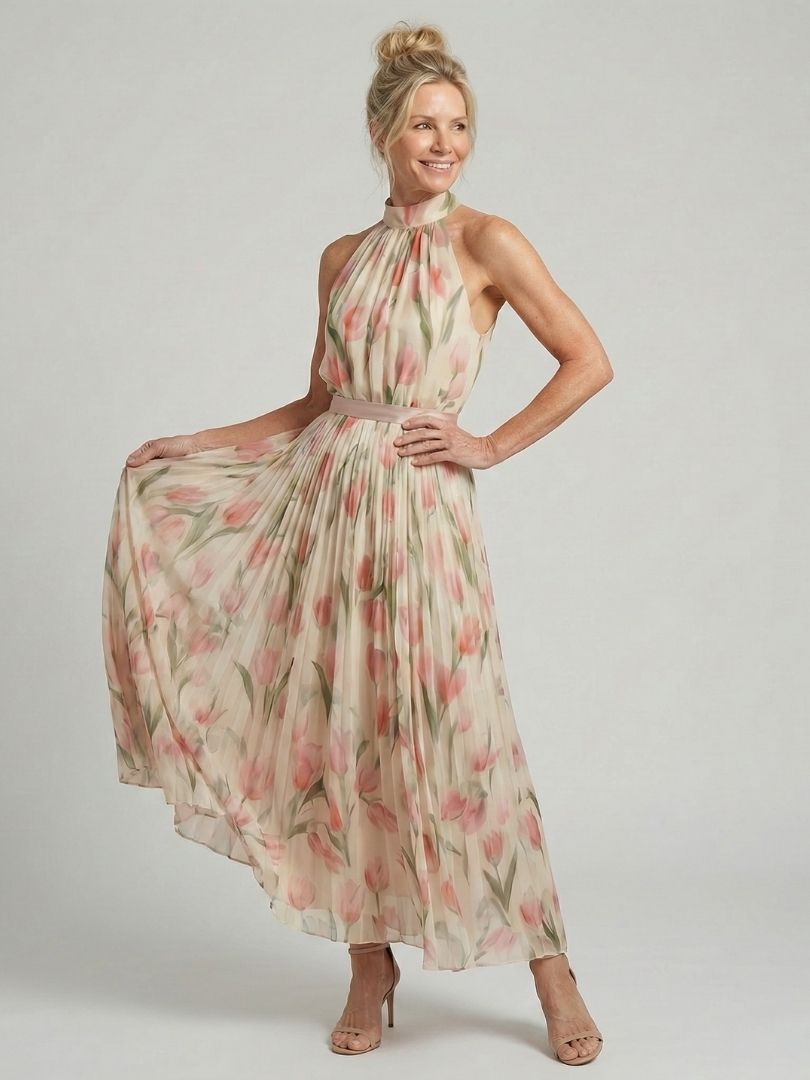 Robe midi fleurie col montant sans manches, jupe ample plissée, ceinture à la taille