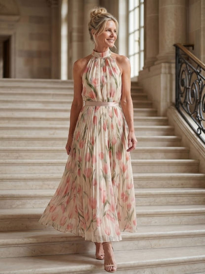 Robe midi fleurie col montant sans manches, ceinture, jupe ample, motifs floraux