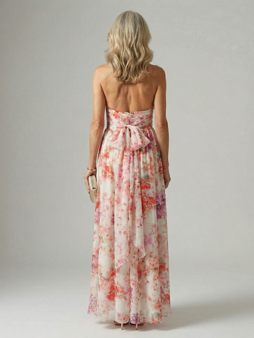 Robe longue dos nu avec attache au cou, imprimé floral sur fond clair