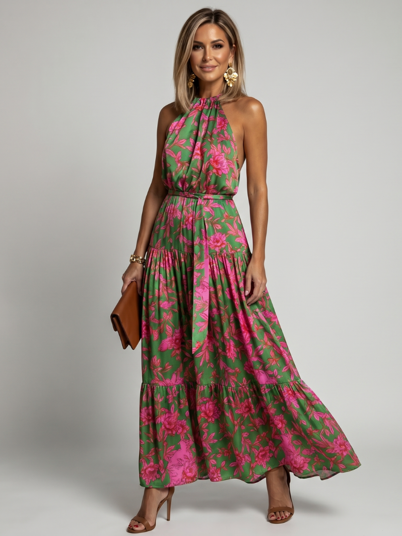 Robe mi-longue drapée à col montant sans manches, vert à fleurs roses, ceinture et volants.