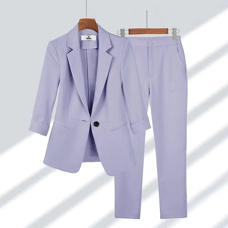 Ensemble blazer et pantalon violet clair, col à revers, boutonnage simple, coupe tailleur