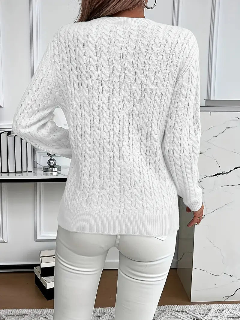 Pull en maille torsadée blanche à col rond et manches longues